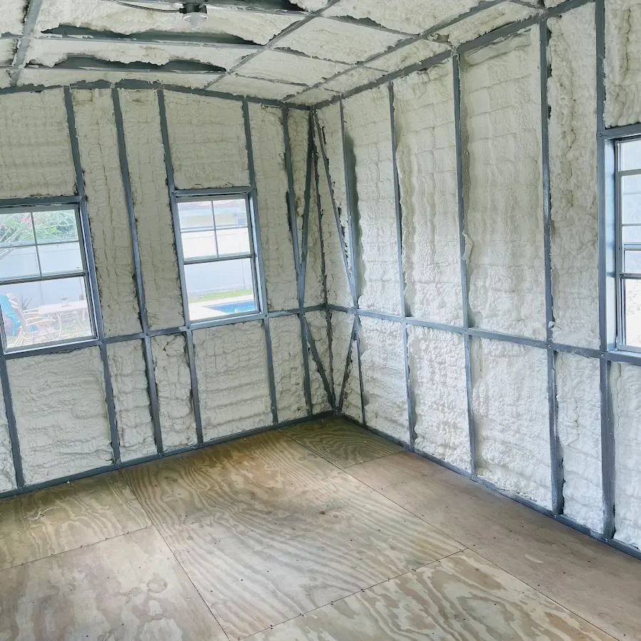 Closed-cell spray foam insulation applied to wall cavities in a residential project in Parkville